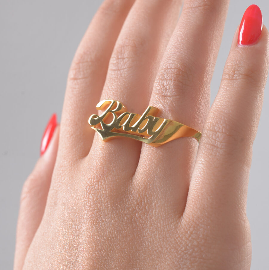 two finger handmade gold baby ring custom letter on hand with red nails