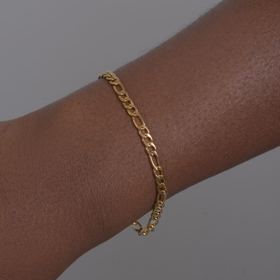 figaro classic chain bracelet gold stainless steel on black skin girl