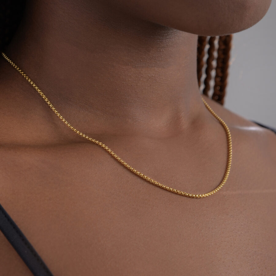 minimal small everyday chain unisex gold cube link stainless steel waterproof on black skin girl