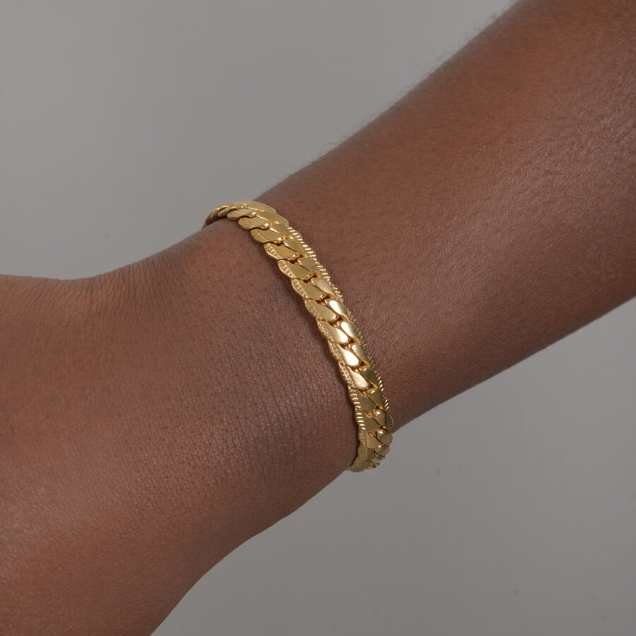 snake bracelet gold on black hand skin classic everyday minimal waterproof bracelet jewellery